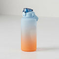 Gradient water bottle with blue top and orange bottom on a white background